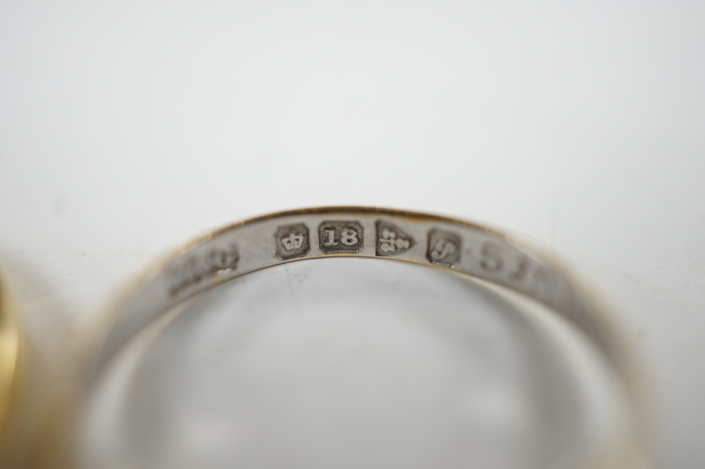 A George V 18ct white gold, sapphire and diamond cluster set ring, size K and one other 18ct, sapphire and diamond set half hoop ring, gross weight 7 grams.